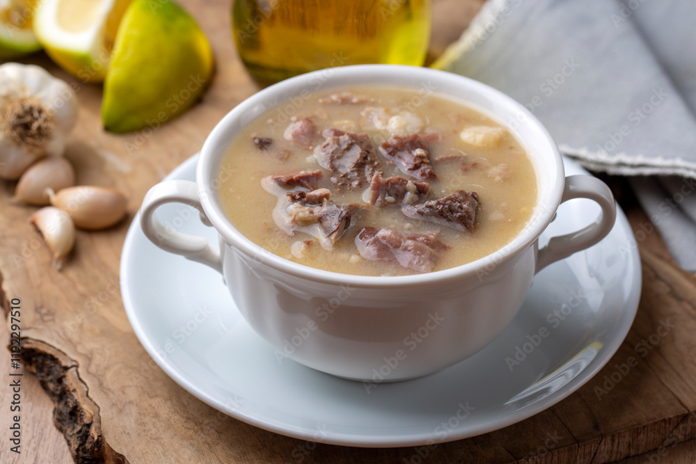 Traditional delicious Turkish food, Turkish traditional tripe soup; iskembe corbasi and offal soup, Turkish Meat Soup Kelle Paca (Turkish name; Kelle paca corbasi)