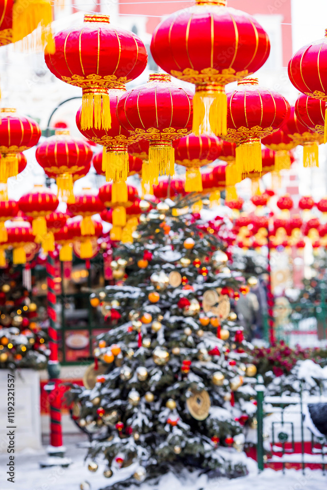 Fototapeta premium Chinese red Christmas lanterns on Tverskaya Street in Moscow. Close-up. The first ever meeting of the Chinese New Year 2024 in Moscow.