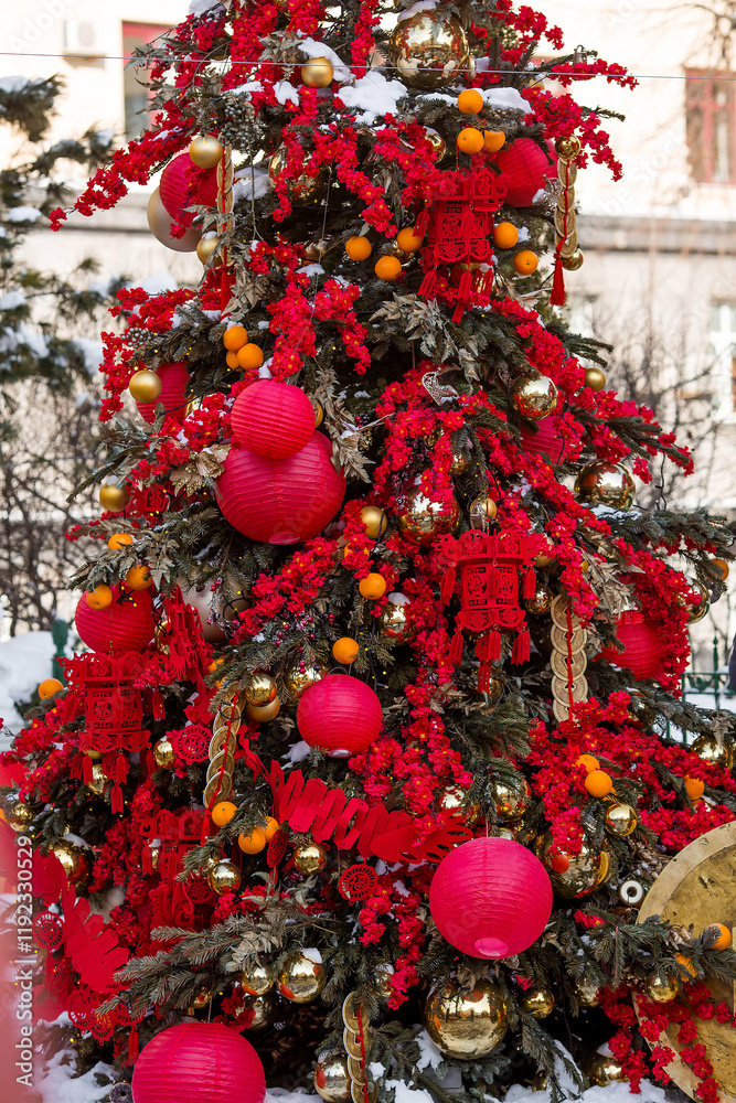Fototapeta premium Chinese red Christmas lanterns on Tverskaya Street in Moscow. Close-up. The first ever meeting of the Chinese New Year 2024 in Moscow.