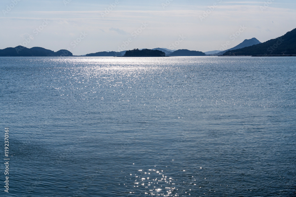 calm sea with islands on a sunny day calm sea with islands on a sunny day