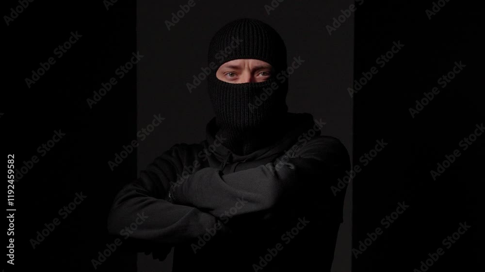 Man in Black Balaclava and Gloves in Low Light Man in Black Balaclava and Gloves in Low Light