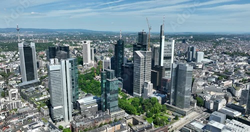 Looking at the financial district of Frankfurt Am main, city view, skyscrapers, buildings, office towers. Aerial view by drone. photo