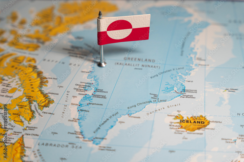 Fototapeta premium The Greenlandic flag pinpointed on a map of Greenland, representing national identity and territorial sovereignty on Arctic region