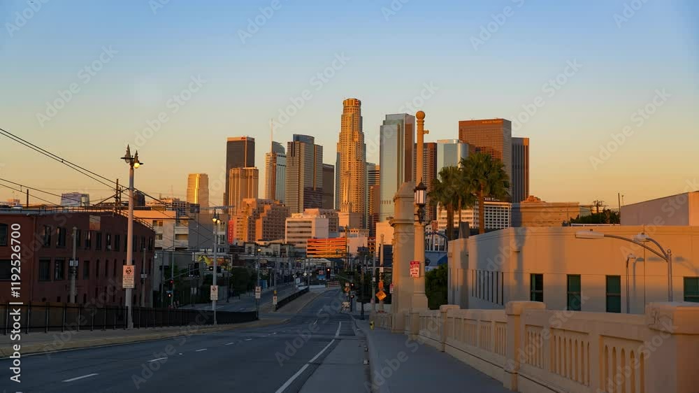 Time Lapse Lockdown Shot Of Cars Moving Towards Modern Buildings In Financial District From Day To Sunset - Los Angeles, California Time Lapse Lockdown Shot Of Cars Moving Towards Modern Buildings In Financial District From Day To Sunset - Los Angeles, California