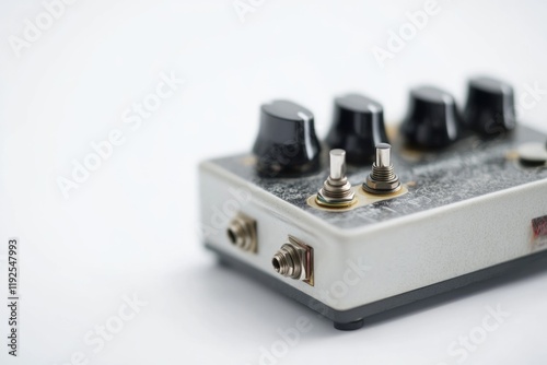 Close-up shot of a guitar pedal on a white background
