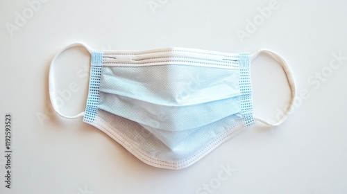 Medical cloth face mask isolated on a clean white background for healthcare and hygiene related concepts photo