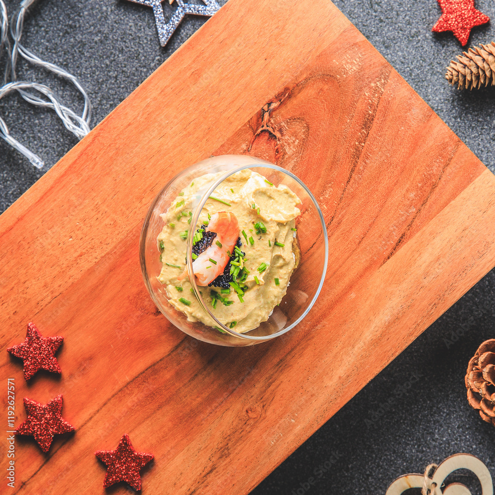 Verrine avocado shrimp pink fresh cheese guacamole chives cream lumpfish roe - decorated for Christmas