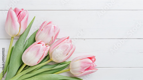 bouquet of tulips on wooden background