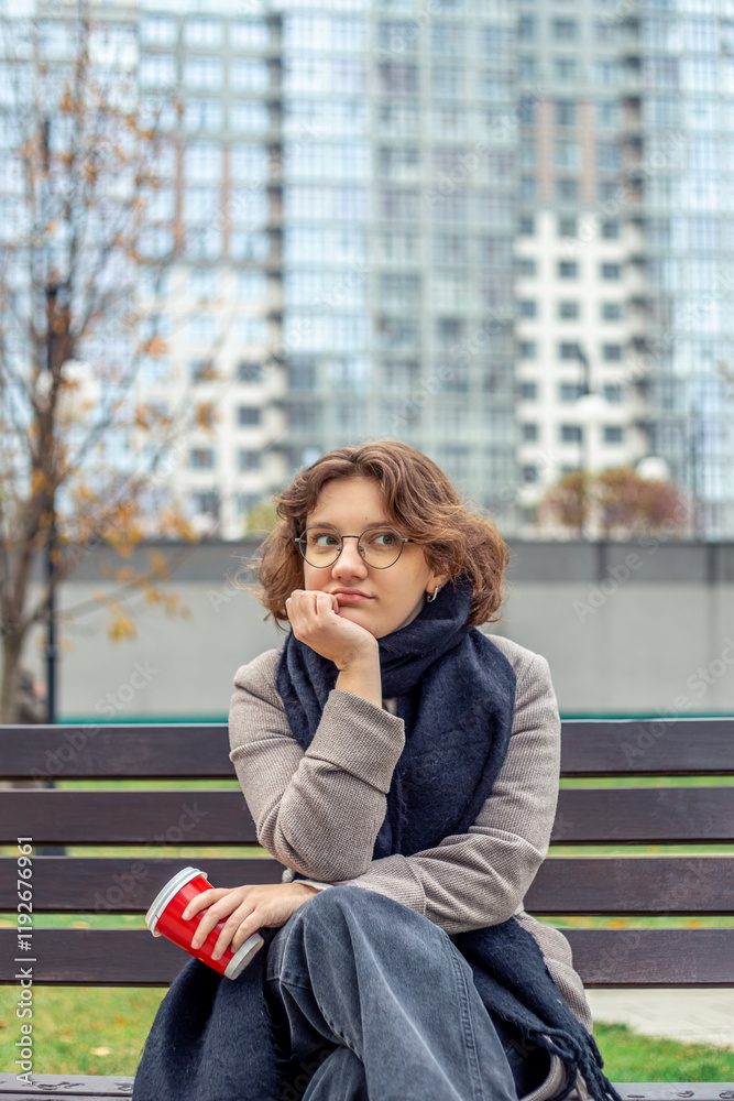 Portrait of a young woman in a big city. Woman in the city. Portrait of a young woman in a big city. Woman in the city.