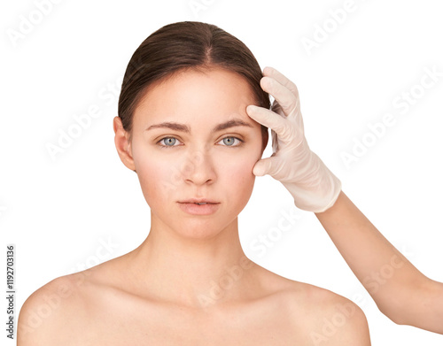 Caucasian young female examined by medical professional in gloved hand for skin 