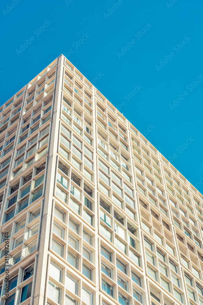 Modern high-rise building against a clear blue skyin Marseille, France Modern high-rise building against a clear blue skyin Marseille, France