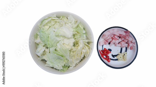 Fresh cabbage with spices ready to cook on white background