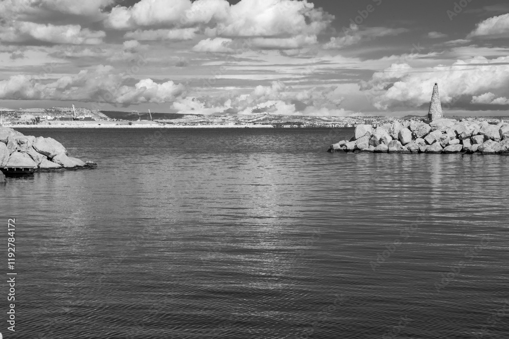 Fototapeta premium The picturesque fishing port of Larnaca, Cyprus, where colorful boats sway gently in the harbor, reflecting the timeless charm of Mediterranean coastal life