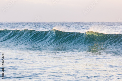 Fototapeta Naklejka Na Ścianę i Meble -  Clean blue wave in the morning.