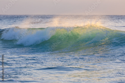 Fototapeta Naklejka Na Ścianę i Meble -  Beautiful wave under the morning light.