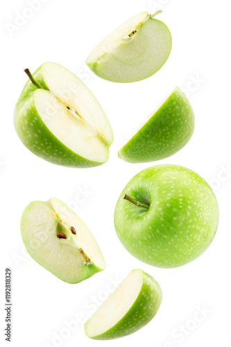 falling green apple with slices isolated on a white background