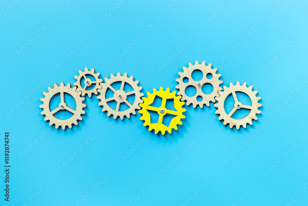 One cogwheel matches to chain of gears. New team member or new idea concept One cogwheel matches to chain of gears. New team member or new idea concept