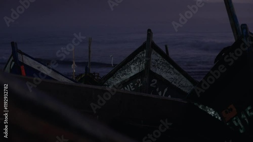 Fishing boats in a harbour, evening sunset scene, Morocco photo