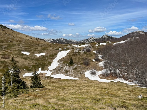 The last remnants of spring snow after a long and harsh mountain winter - Northern Velebit National Park, Croatia (Posljednji proljetni ostaci snijega nakon duge i oštre zime - NP Sjeverni Velebit) photo