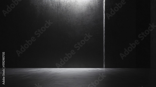 A minimalist dark room with stark contrasts, lit dramatically by a singular light source. The rugged textures amplify the mysterious atmosphere. photo