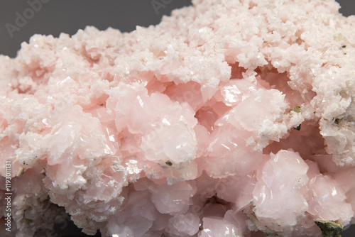 Calcite, pink crystals with a sprinkling of white acicular calcite photo