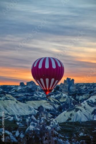 hot air balloon flying in the sky at cappadocia, nevsehir photo