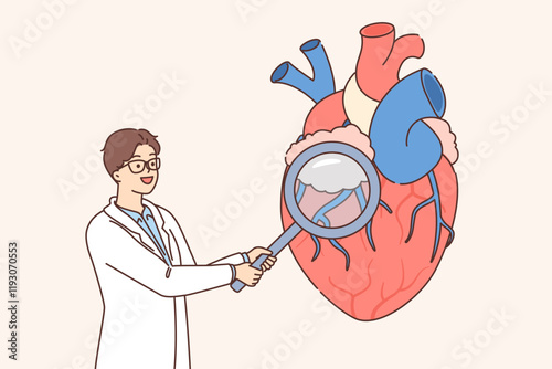Doctor cardiac surgeon examines heart using magnifying glass to look for pathologies and diseases