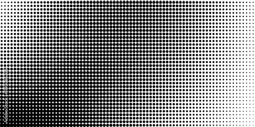 Dotted halftone gradient texture. Vanishing polka dot background. Repeating dots gradation pattern background. Black fading comic pop art overlay backdrop.