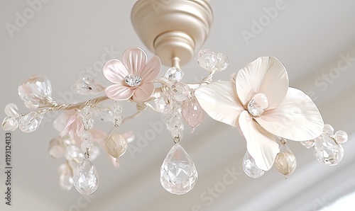 Floral chandelier with crystals hanging from ceiling in home interior photo