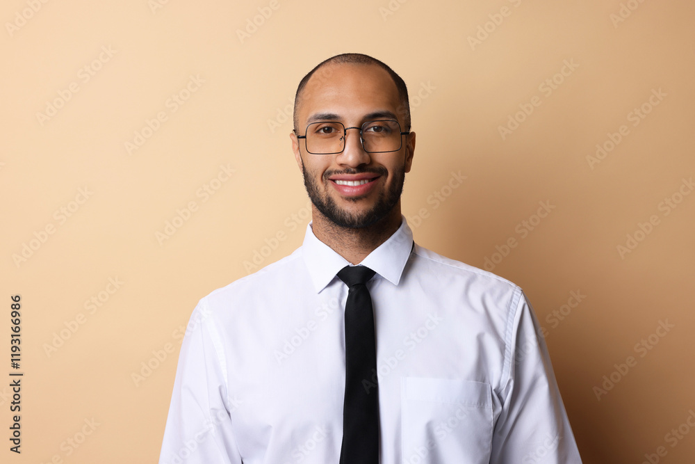 Portrait of businessman in glasses on beige background Portrait of businessman in glasses on beige background