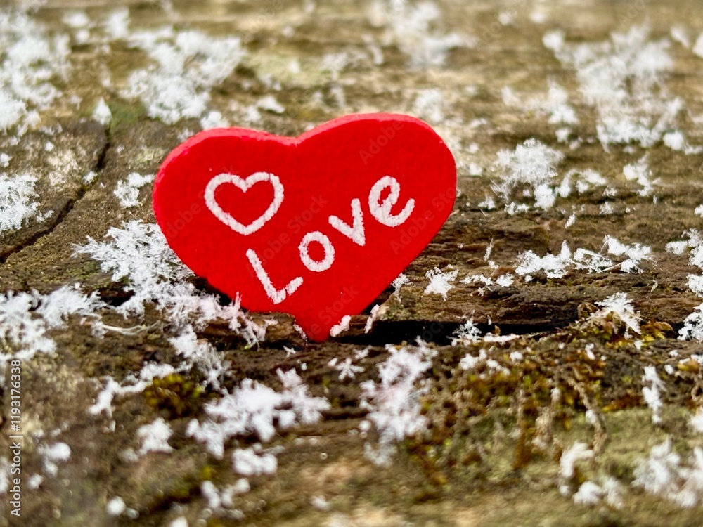 Fototapeta premium red heart in snowflakes