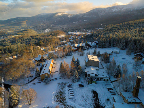 Fototapeta Naklejka Na Ścianę i Meble -  An aerial drone view over Karpacz town in Karkonosze mountains during winter, Poland