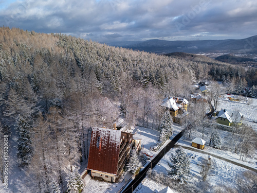 Fototapeta Naklejka Na Ścianę i Meble -  An aerial drone view over Karpacz town in Karkonosze mountains during winter, Poland