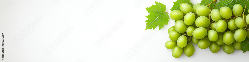 Ripe grapes and grape slices with green leaves arranged on white background. Grapes wallpaper, banner Ripe grapes and grape slices with green leaves arranged on white background. Grapes wallpaper, banner