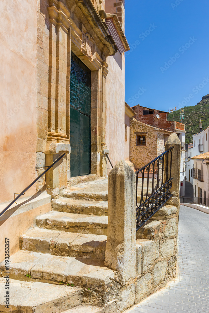 Stairs and entrance of the historic church in Chulilla, Spain
