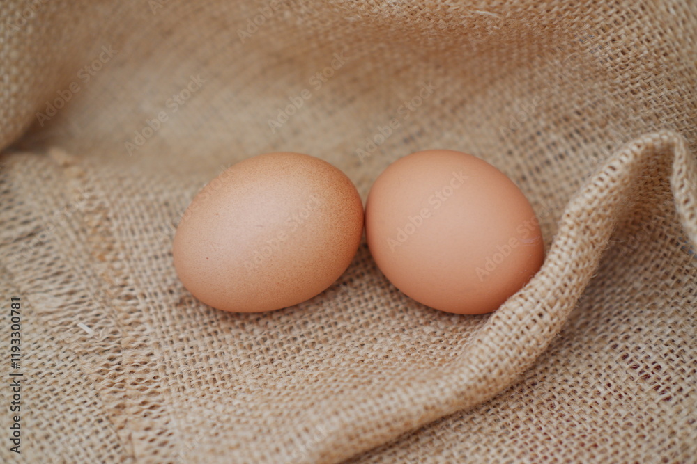 egg on gunny sack. selective focus egg on gunny sack. selective focus