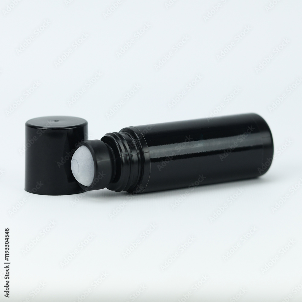 Black roller deodorant or pain relief gel bottle with open cap. blank label for product mockup presentation Black roller deodorant or pain relief gel bottle with open cap. blank label for product mockup presentation