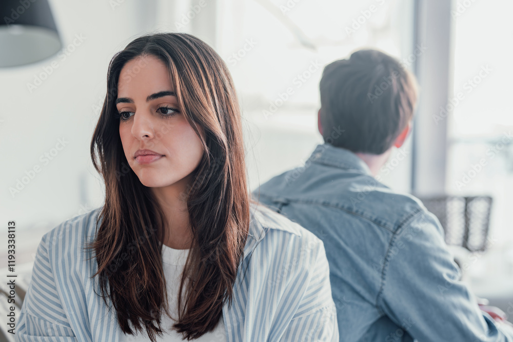 © Daniel - Beautiful lady is depressed, sitting on the couch talking to man, having a dispute with husband or girlfriend, looking desperate and hopeless, having unresolved problem or question. © Daniel - Beautiful lady is depressed, sitting on the couch talking to man, having a dispute with husband or girlfriend, looking desperate and hopeless, having unresolved problem or question.