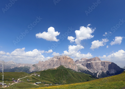 view of the European Alps in Northern Italy with the Sella massif group on the left and Mount SASS PORDOI on the right photo