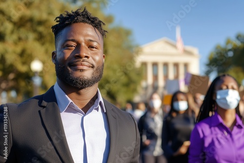 Male activist leading peaceful protest for social justice. Black History Month photo