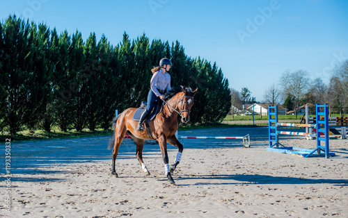 Konstfotografi beautiful young woman riding her young mare outdoors