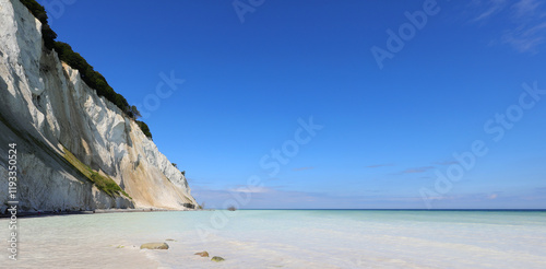 Fototapeta Naklejka Na Ścianę i Meble -  landscape with white hot carbonate cliff at small on the Baltic Sea in southern Denmark in Europe
