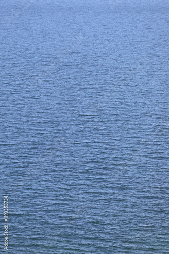 background with the placid salt waters of the calm blue sea without boats
