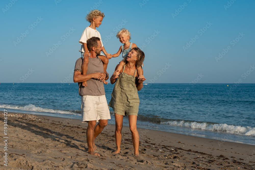 Happy Family Strolling Along the Beach.. Happy Family Strolling Along the Beach..