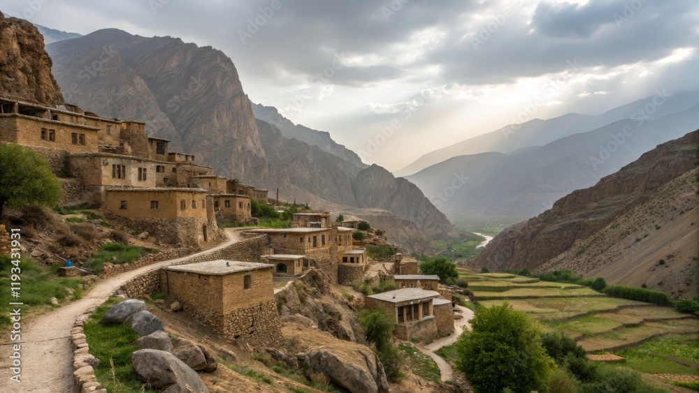 Fototapeta premium Mountain Village Landscape Sunlit Houses, Winding Path, Dramatic Valley, Afghanistan. ,Afghanistan,village