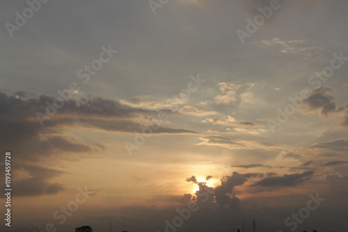 Beautiful sky with natural gradations. Thick clouds in the dusk sky on a winter night. Image of a cloudy sky in the afternoon. View of the night sky with golden light from the evening sun