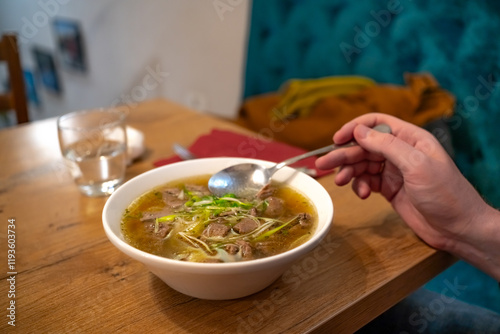 a bowl of soup. Traditional Vietnamese Phobo soup photo