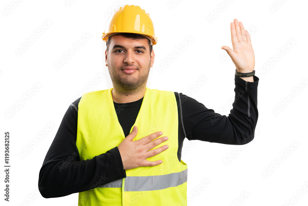 Serious constructor man making honest oath gesture with palm Serious constructor man making honest oath gesture with palm