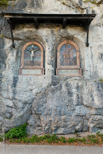 Salzburg, Austria. Religious depiction on exterior old medieval wall of the S...
