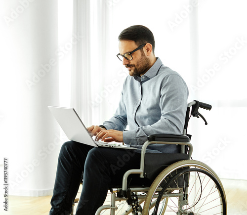 disability wheelchair disabled man handicap sitting handicapped health young wheel care laptop computer using technology home hospital invalid patient healthcare
